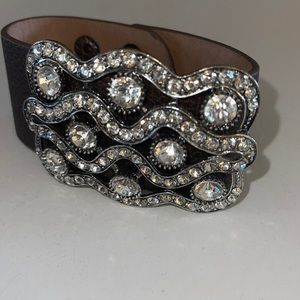 Plunder leather cuff with beautiful rhinestone brooch.